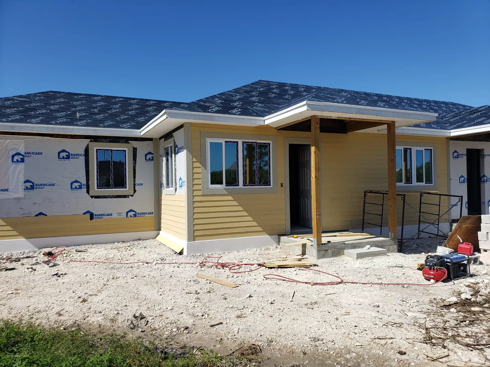 New single-storey home with siding and a covered entry